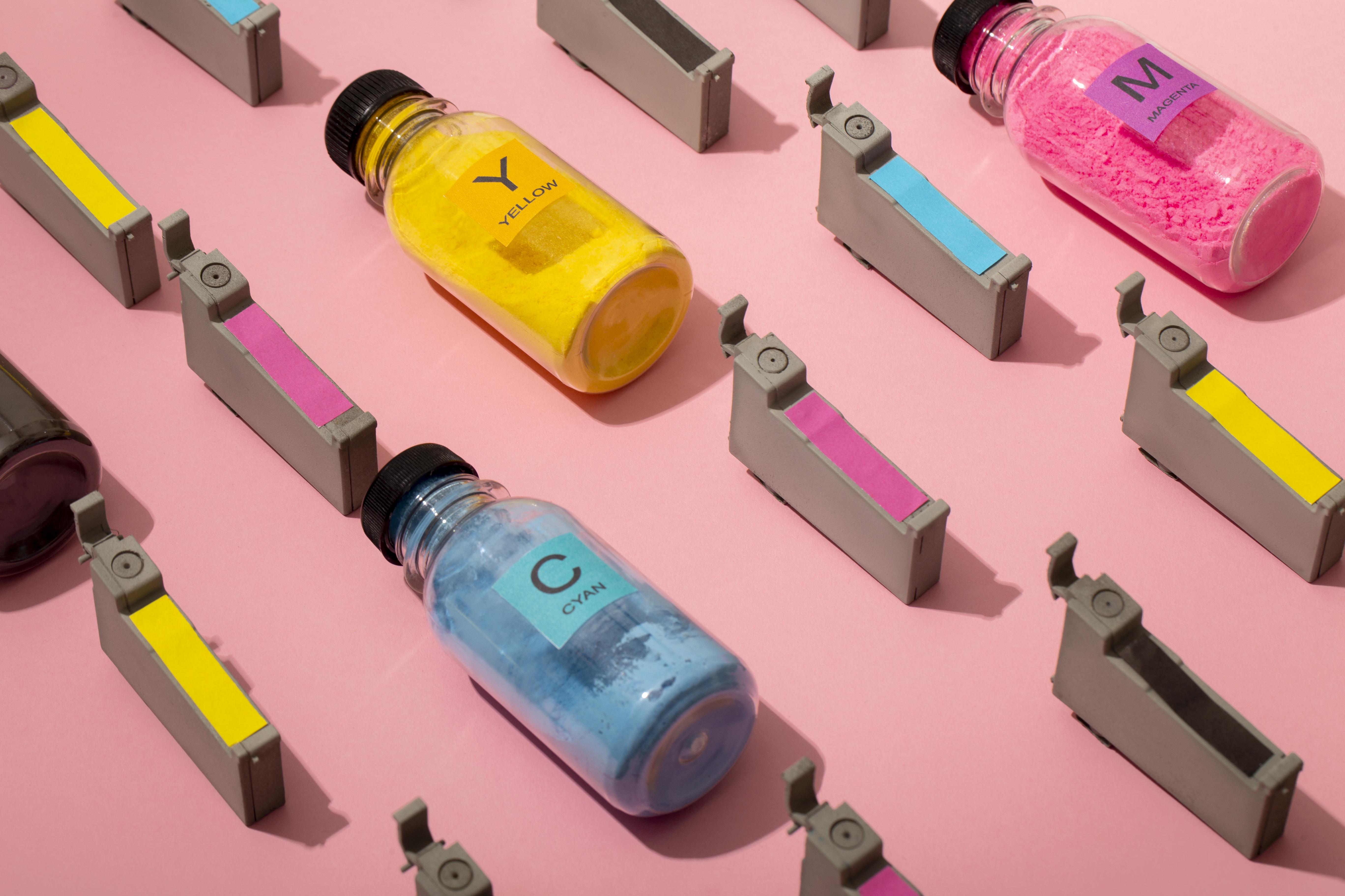 Understanding CMYK, Bleed and DPI ink and toner cartridges, and bottles of the powder that makes ink